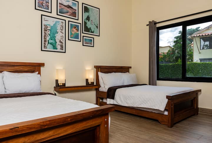 Enjoy a beautiful photo collage celebrating Colombia’s landscapes, adding cultural warmth to the room. This unique decor brings an authentic Colombian vibe, creating an inviting space for guests to relax, unwind, and experience local charm.