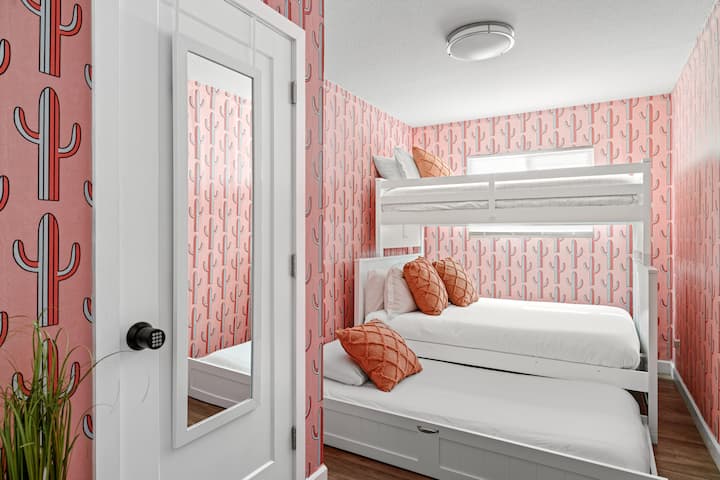 Bedroom 3 features a trundle bunk bed with comfortable mattresses, pillows and linens.