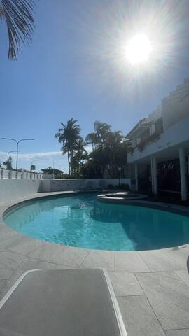 Serene Ground Floor Apt 800m to Hastings Street!