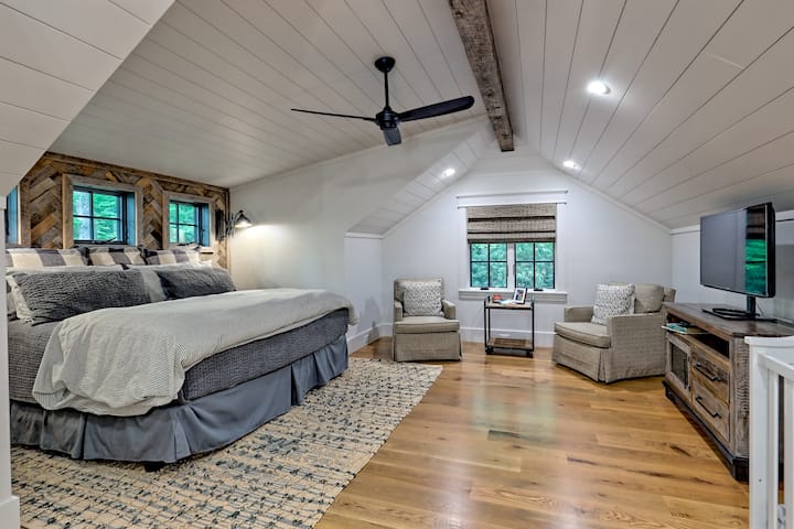 Above the garage is a generous "second master" with ensuite bath, vaulted ceilings, and a walk in closet.