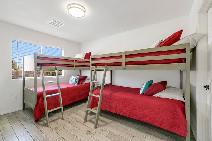Bedroom 3 which includes 2 bunk beds, Smart TV and walk in closet.
