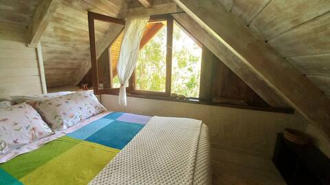 Calid cabin surrounded by lakes and mountains