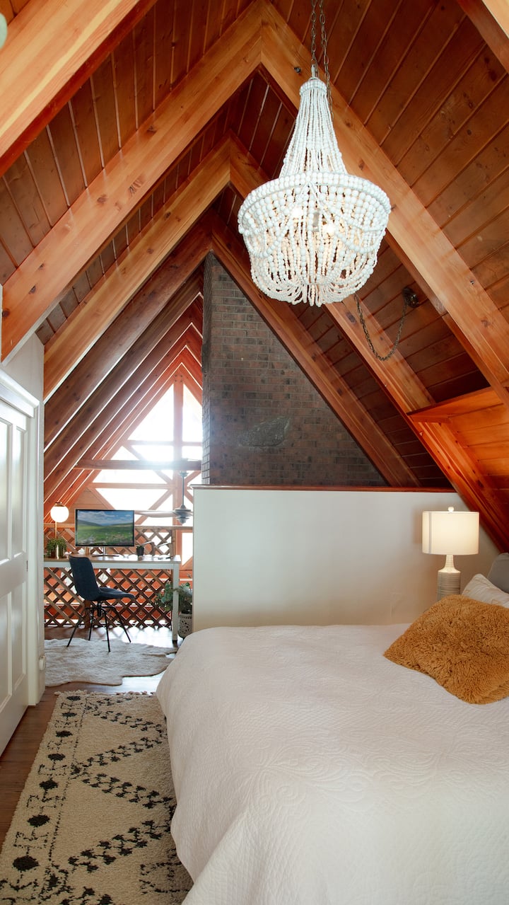 Beautiful loft bedroom with a comfy king mattress.