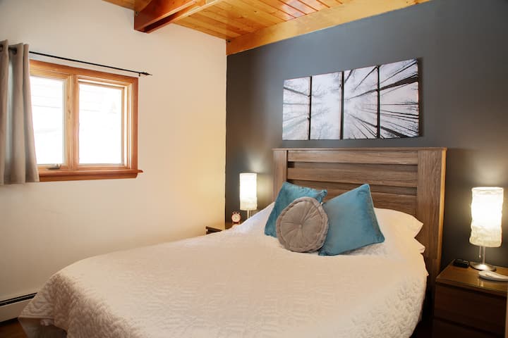 Main floor bedroom with comfy queen mattress