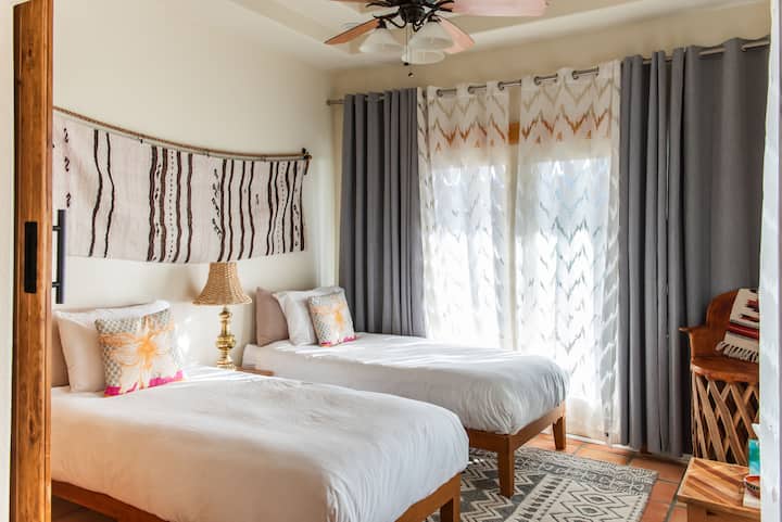 Bedroom #4 can be configured as a 2 twin beds (or 1 king) and has large windows and sliding barn door. 