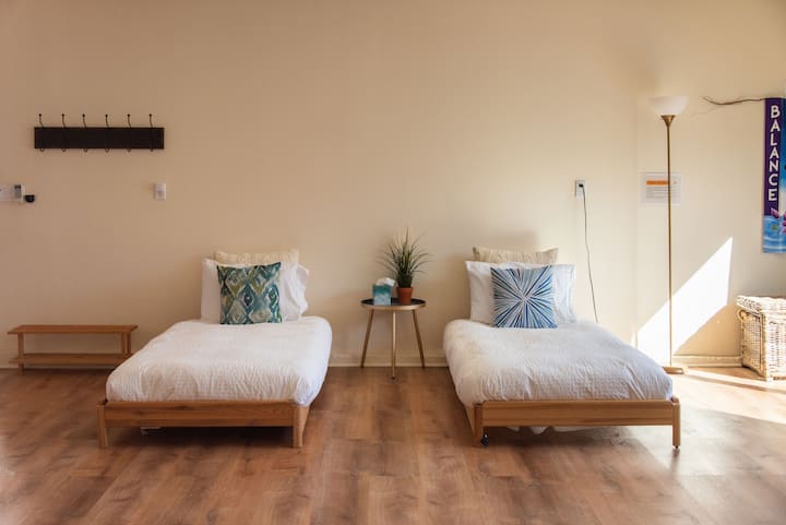Yoga Studio may be used as the 7th bedroom. Beds can be set up as a daybed for lounging or 1 or 2 twin beds for sleeping. Beds are lightweight, can be moved to make extra space for practice. Room features a small locker for personal belongings.