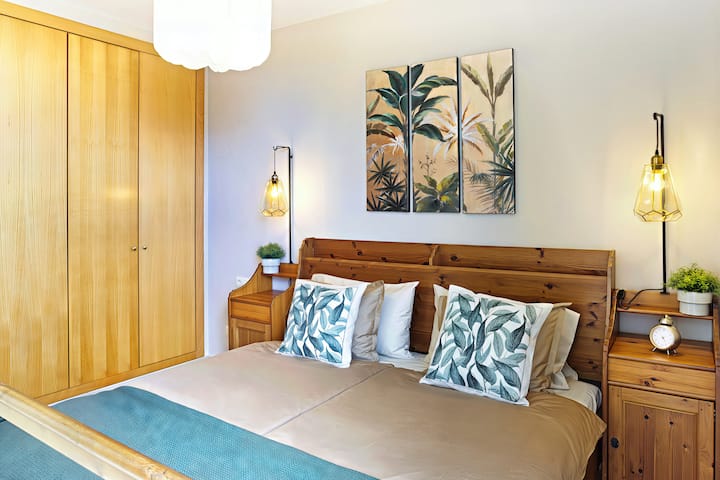 Rest in your Tenerife bedroom with ocean-view balcony.