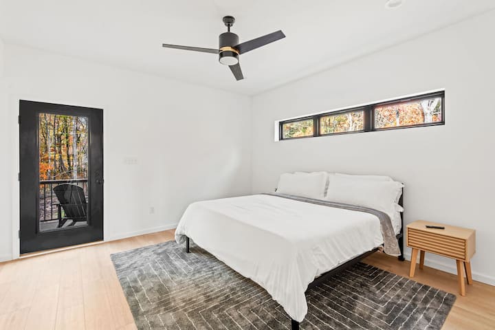 This spacious room features a king bed, Smart TV, and bunks for a perfect multi-generational setup.