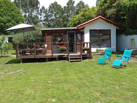 Beach cabin with garden.