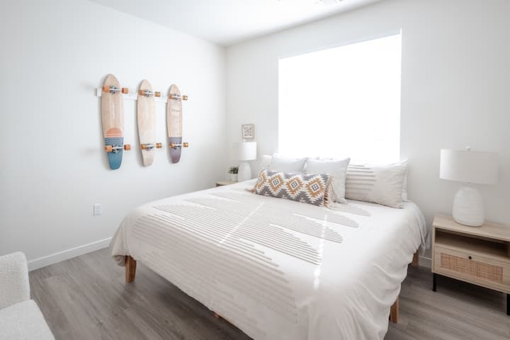 King sized luxury in this fun, skate-themed room.  Two nightstands and closet for storage. Comfy couch to relax, and TV to enjoy your favorite movies. 