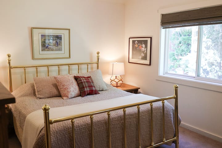A King sized bed greets you on the second floor overlooking the backyard.