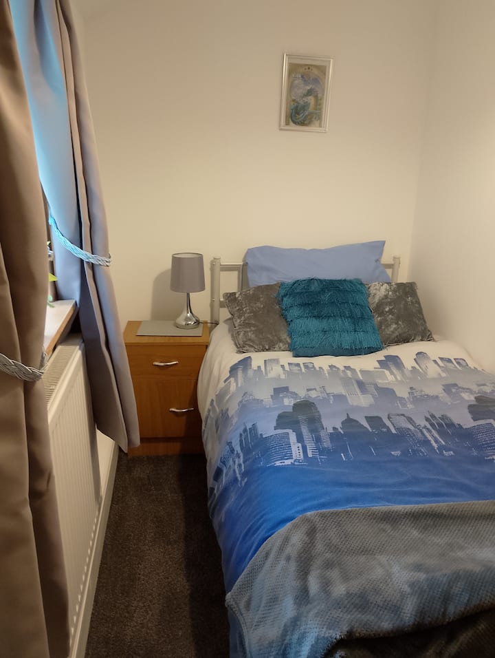 Single bed suitable for adult or child.