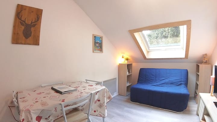 The sofa area with books available