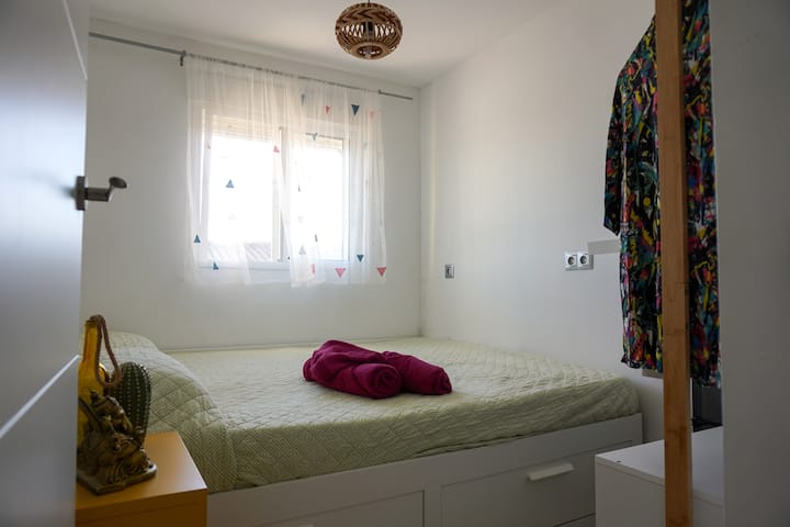 Welcome to our third room, where you'll find a comfortable double bed and breathtaking views of the sea. Wake up to the serene sight of the ocean just outside your window, perfect for a peaceful and relaxing stay.