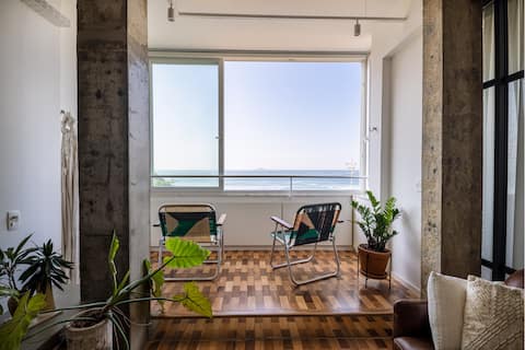 Top Airbnb: Beachfront Designer Flat with Stunning Ocean Views in Rio De Janeiro