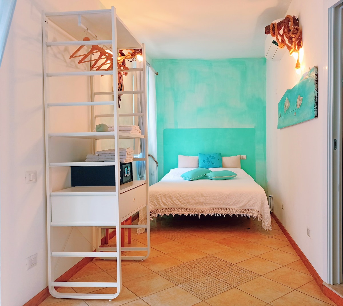 CasaMusella 555  Le Conchiglie, חדר שינה עם מיטה זוגית 