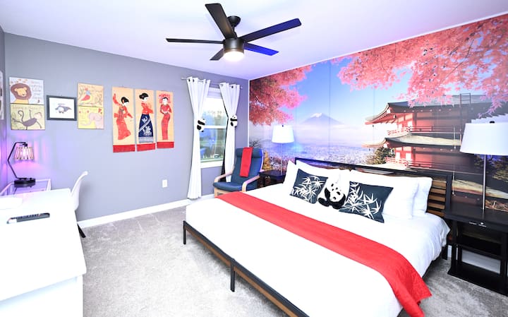 Bedroom 5 Asia King:  Scenic view of Mount Fuji, Asian girls' costumes, Kung Fu Panda's journey of self-discovery.  Bed with award-winning firm mattress,TV,  fan, desk, armchair, attached bathroom that is shared with Avenger bedroom. 