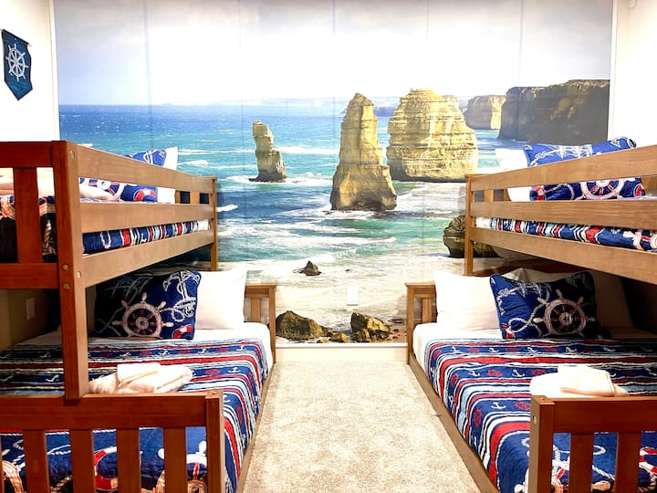 BR9 The Lord of the Ring Two Twin-over-Double: Continue the sea adventure & find profound wisdoms in the Lord of Rings. Award-winning mattress, fans, bunks w/ fancy staircases & safe for todollers. Half of this spacipus room is devoted as a theatre. 