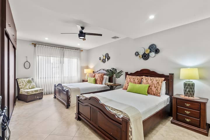 2 queen size beds in first room. High quality linens and brand new mattresses. Extremely comfortable