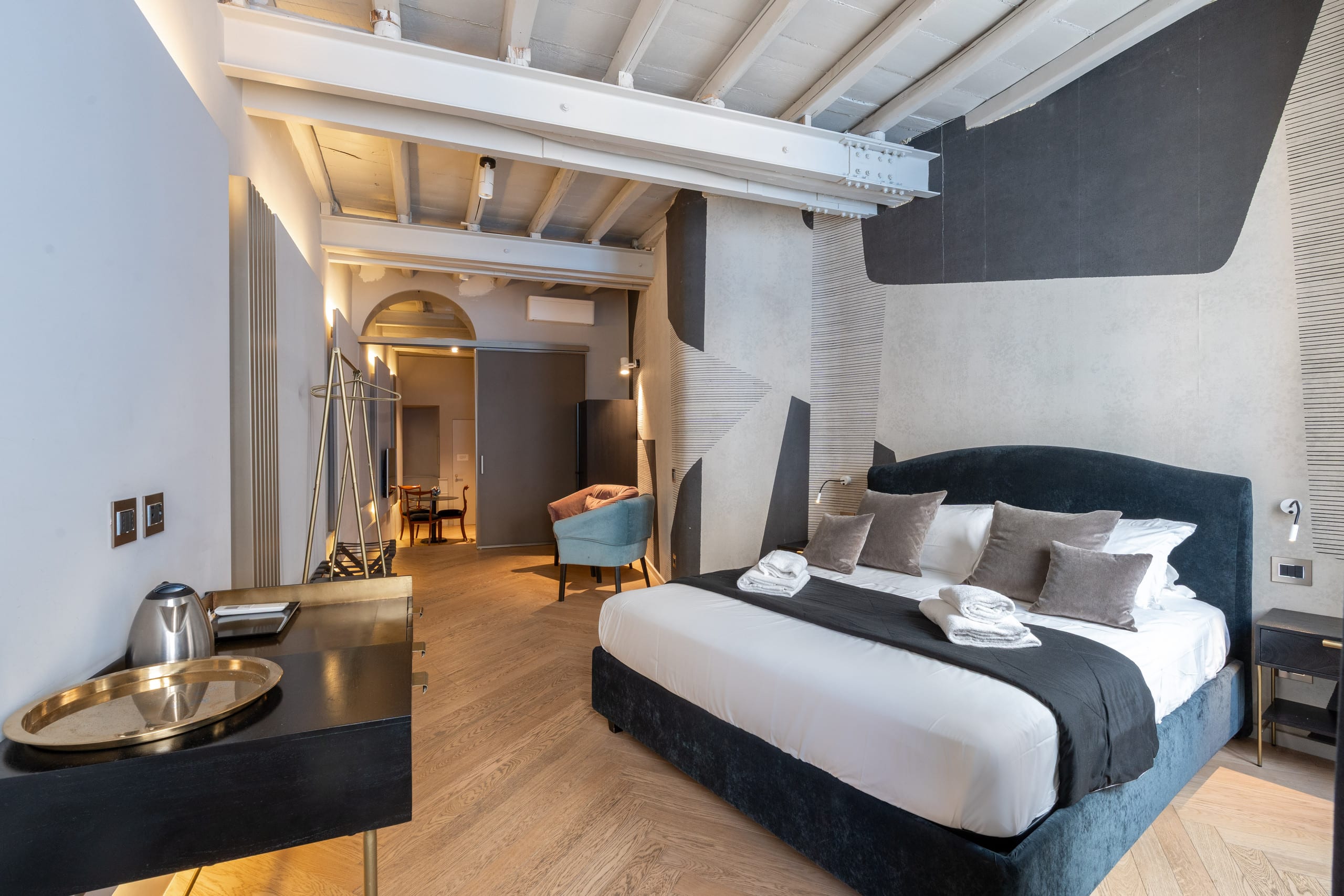 Double bedroom with luxury linens and soft lighting for a romantic atmosphere