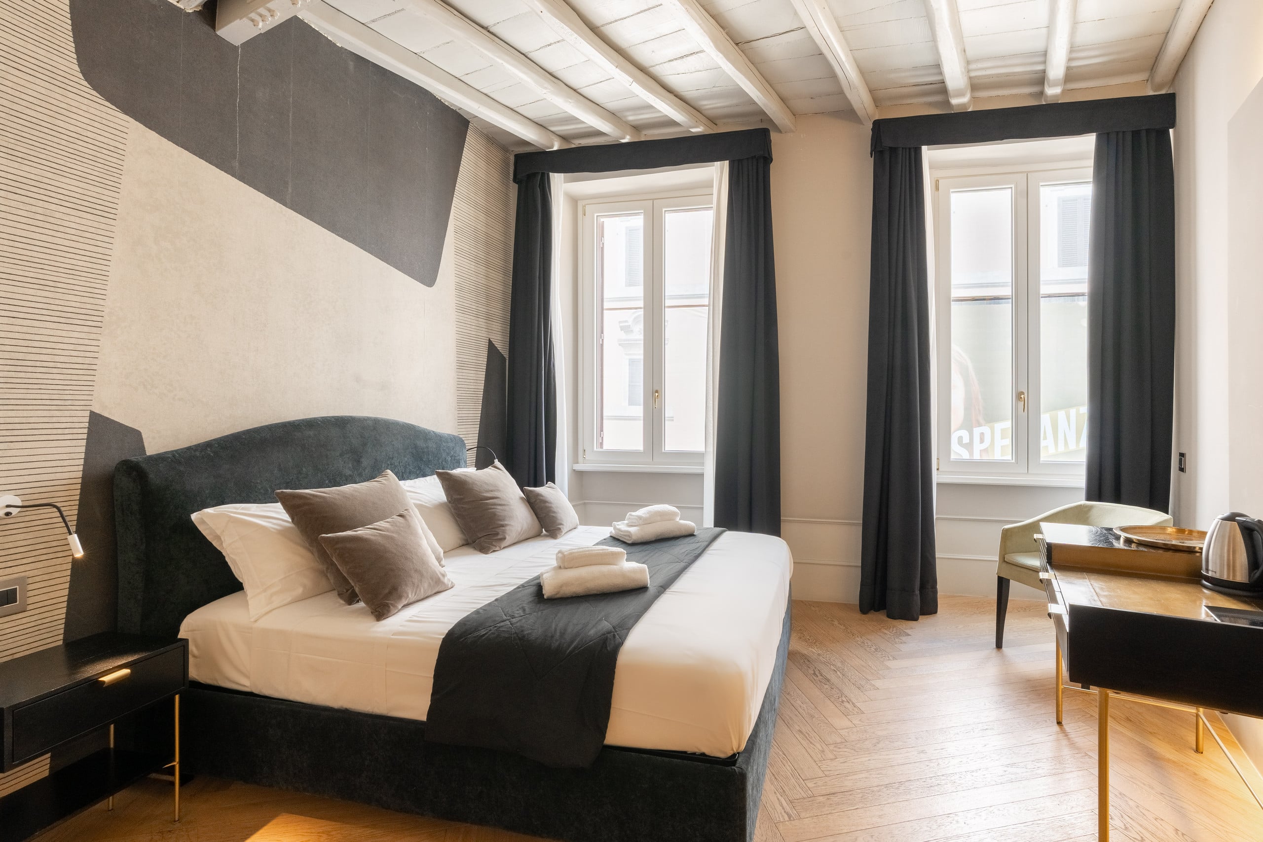 Elegant living area with high ceilings and period details in the Spanish Steps loft