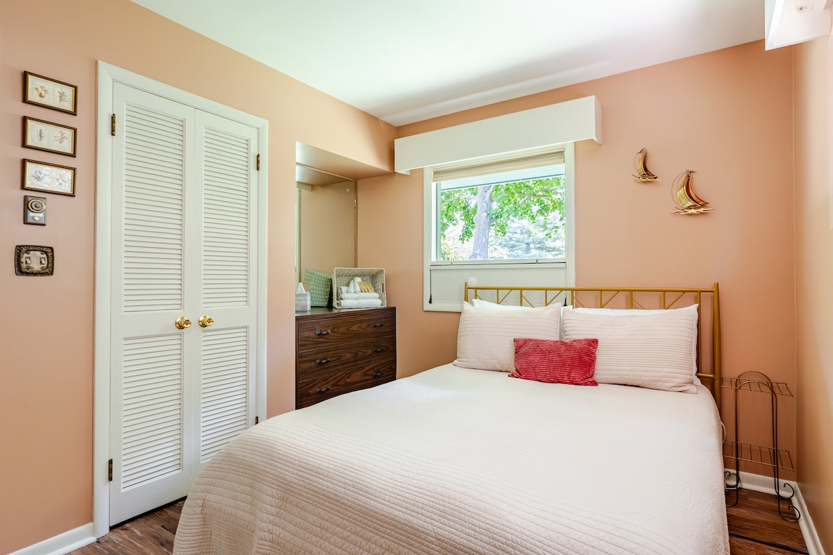Ample closet and dresser for your time here.  The other bedroom views the Lake so we added some sailboats here for you, too.