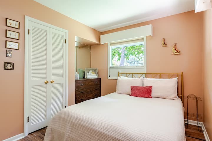 Ample closet and dresser for your time here.  The other bedroom views the Lake so we added some sailboats here for you, too.