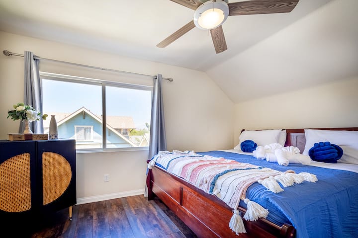 Bright Retreat: Enjoy sunny views and stylish decor in this inviting bedroom oasis!