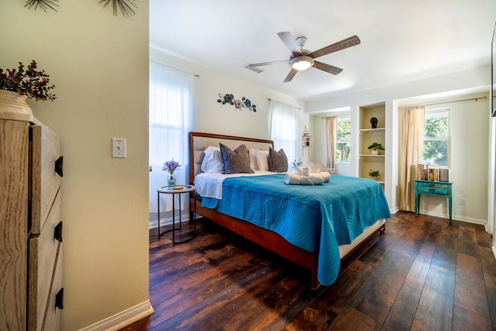 Spacious Retreat: Enjoy sunny mornings in this beautifully decorated bedroom.