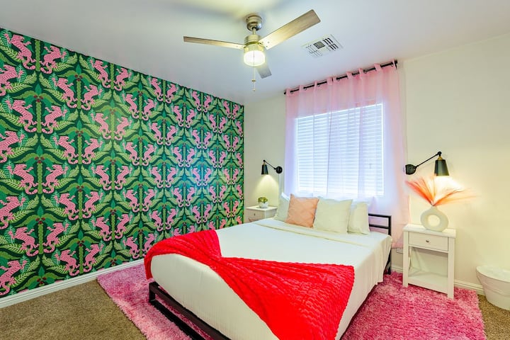 Pink tiger power  This fierce and fabulous room is made for beauty sleep with a wild side.