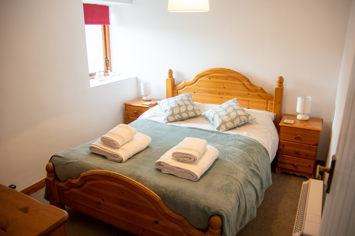 Double bedroom 1, located on the ground floor