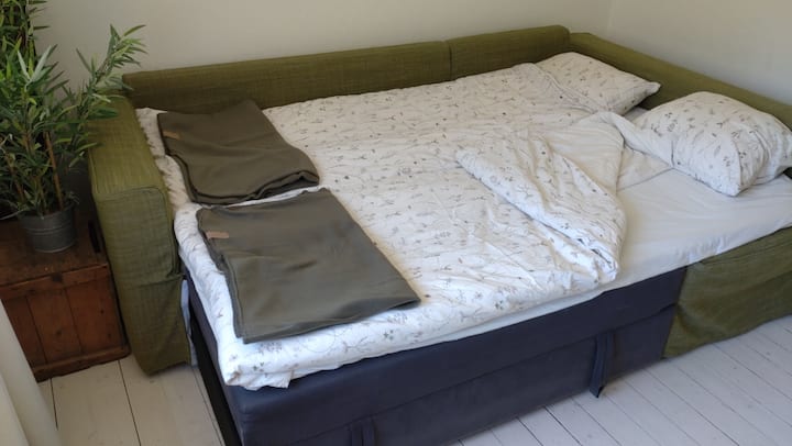 Our green bedroom provides harmony and goodnight sleep. Sofa will be 140 cm bed for 1-2 people.