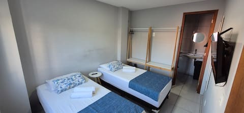 Studio with air-conditioning, electric rain, kitchen.