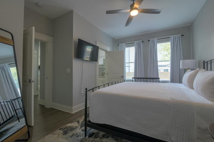 Second bedroom with own bathroom, closet, and smart TV
