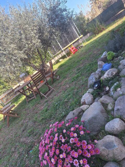 Warm apartment with garden and parking