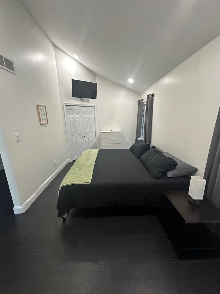Master Bedroom #2 with King Bed, Smart TV, dresser & Closet
