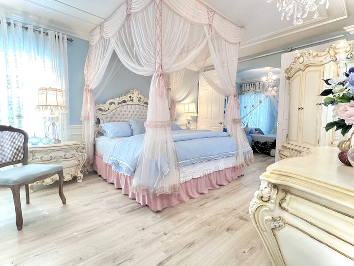 Cinderella's Family Suite has beautifully French-themed rooms with plenty of space for a young family!  It has the largest ensuite bathroom, attached bedroom with twin-sized carriage bed, and a beautiful dressing closet with pack-n-play for baby!