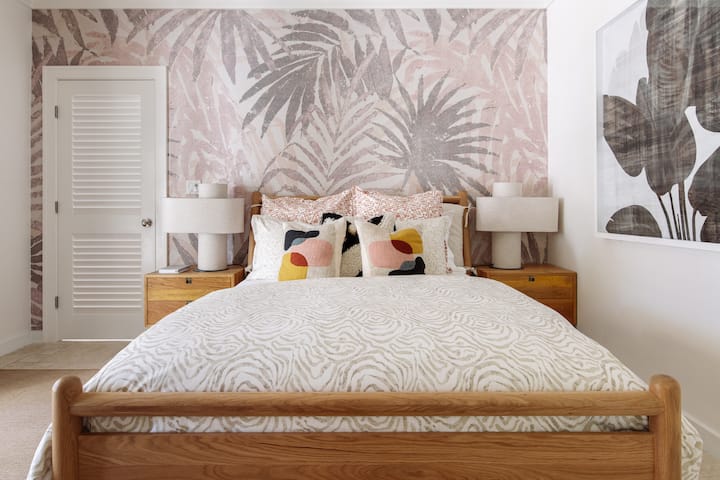 This bedroom is on the main floor, directly off the main entrance and has a queen bed and its own bathroom. 