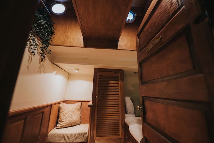 The Nook stateroom - there is our smallest stateroom and features a single bed with a second Murphy bed that folds out of the wall. 