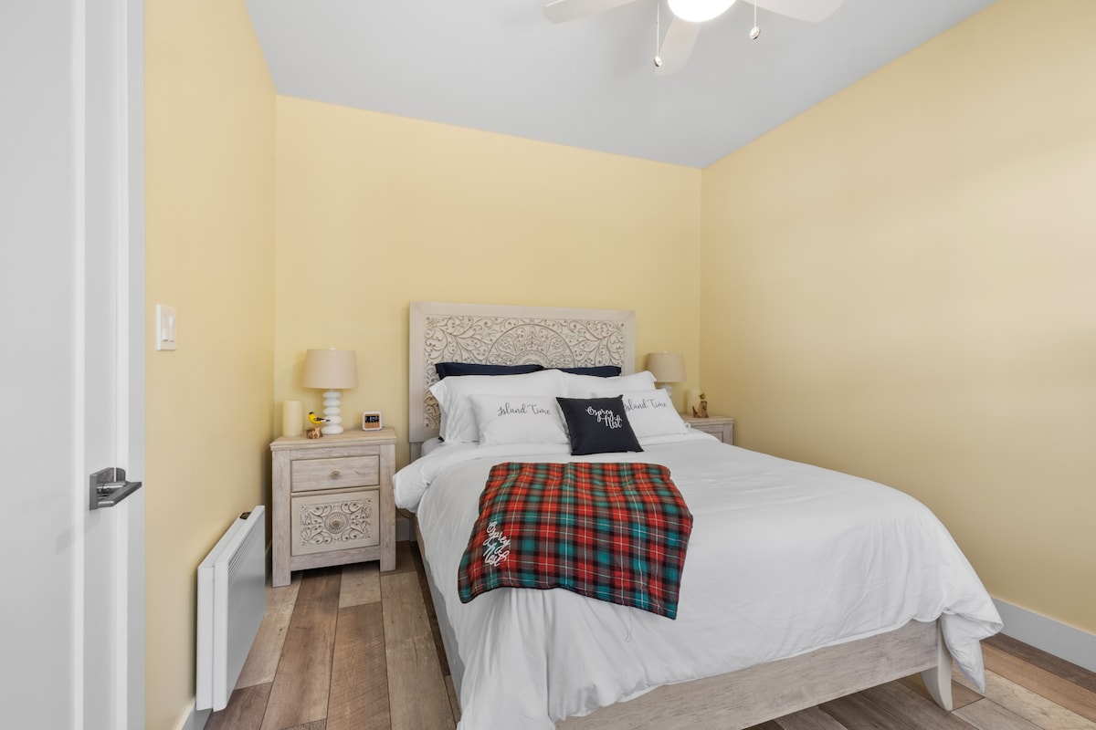 Main floor 3rd bedroom.  Featuring a  Queen sized bed