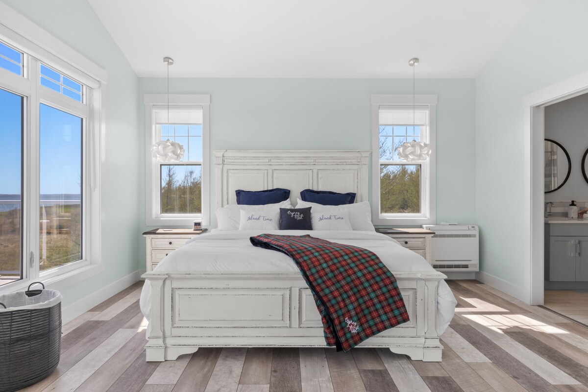 Primary room is spacious with a King sized bed and private office space, ensuite and balcony.