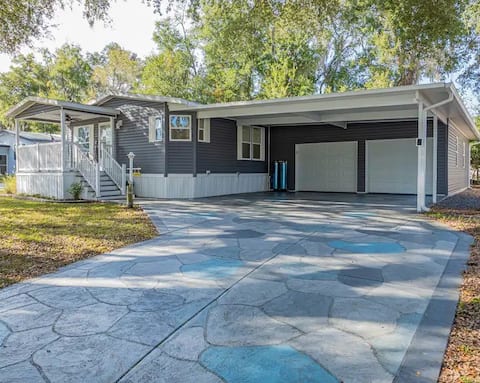 Villages home with unique elevated front porch