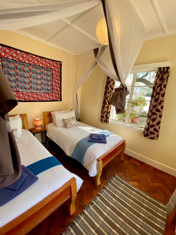 In the main house. Bathroom shared with Bedroom 2.
