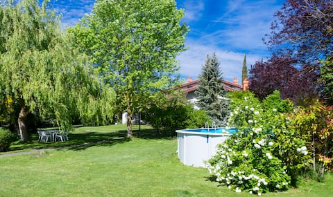 Country house with a large garden and swimming pool