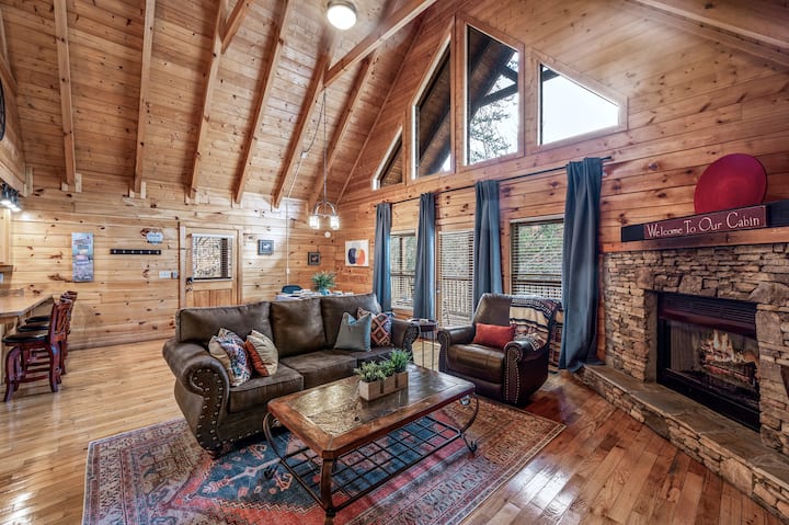 Living room includes a leather queen sleeper sofa, leather recliner, 65” Roku TV, and a natural gas fireplace. The fireplace is shut down from April until October every year.