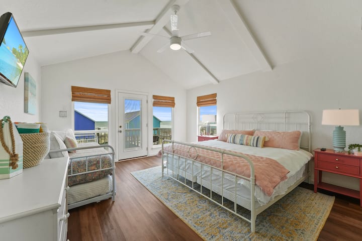 Bedroom 3 features a king-size bed and a twin trundle bed, complete with a ceiling fan and an HDTV for entertainment.  This beautiful, modern room is a true retreat.