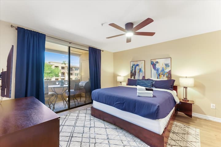 Primary Bedroom with attached bathroom, King size bed with super comfortable mattress. Smart TV in the bedroom and balcony. 