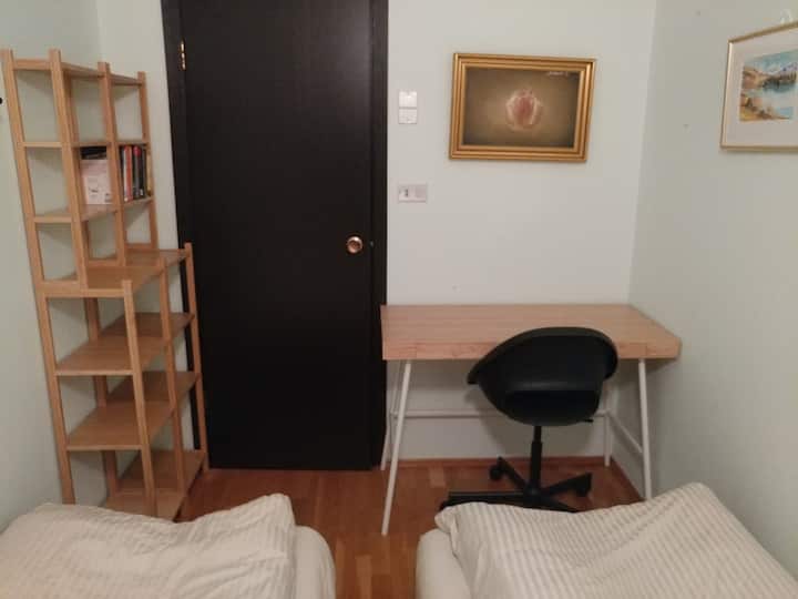 You might be sharing the room pictured, or sleeping in the shared space of the tatami living room.  You may use the various desks that are distributed around the apartment, in the hallways, the green house and depending on availability in the rooms.