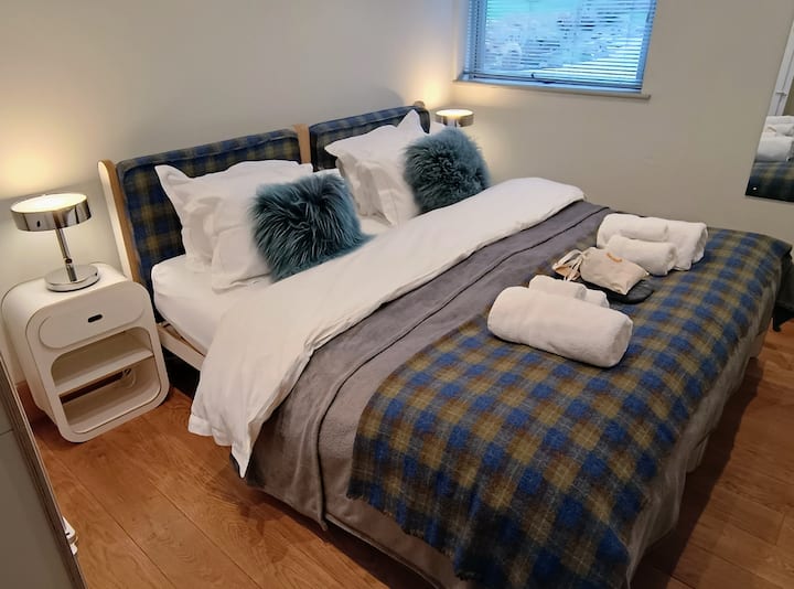 This is bedroom 1's super king size bed configuration. This bedroom can also be configured as two large single beds.