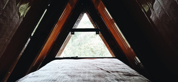 small mezzanine with a double bed